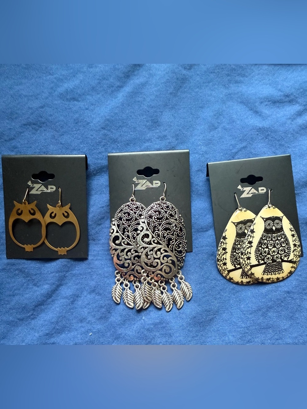 3 sets of Zad earrings, Two with Owl motive and Silver Filigree Teardrop Feather